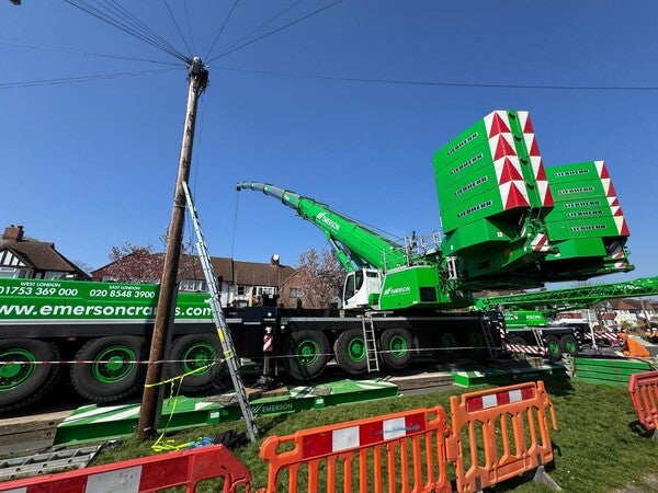 image by Craig Wright containing truck, green, crane, barricade, lift